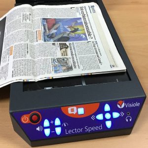 machine à lire Lector Speed avec un journal